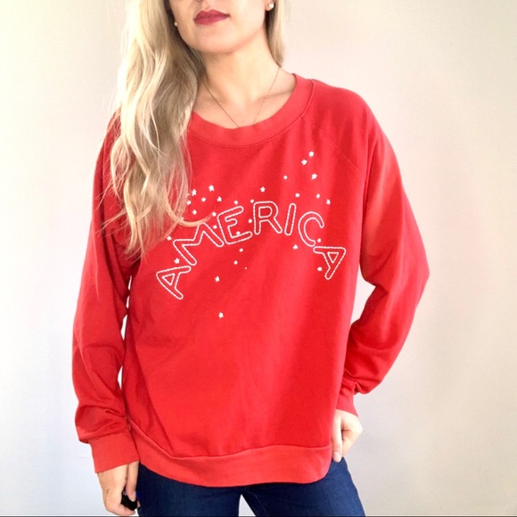 red sweatshirt with white stars
